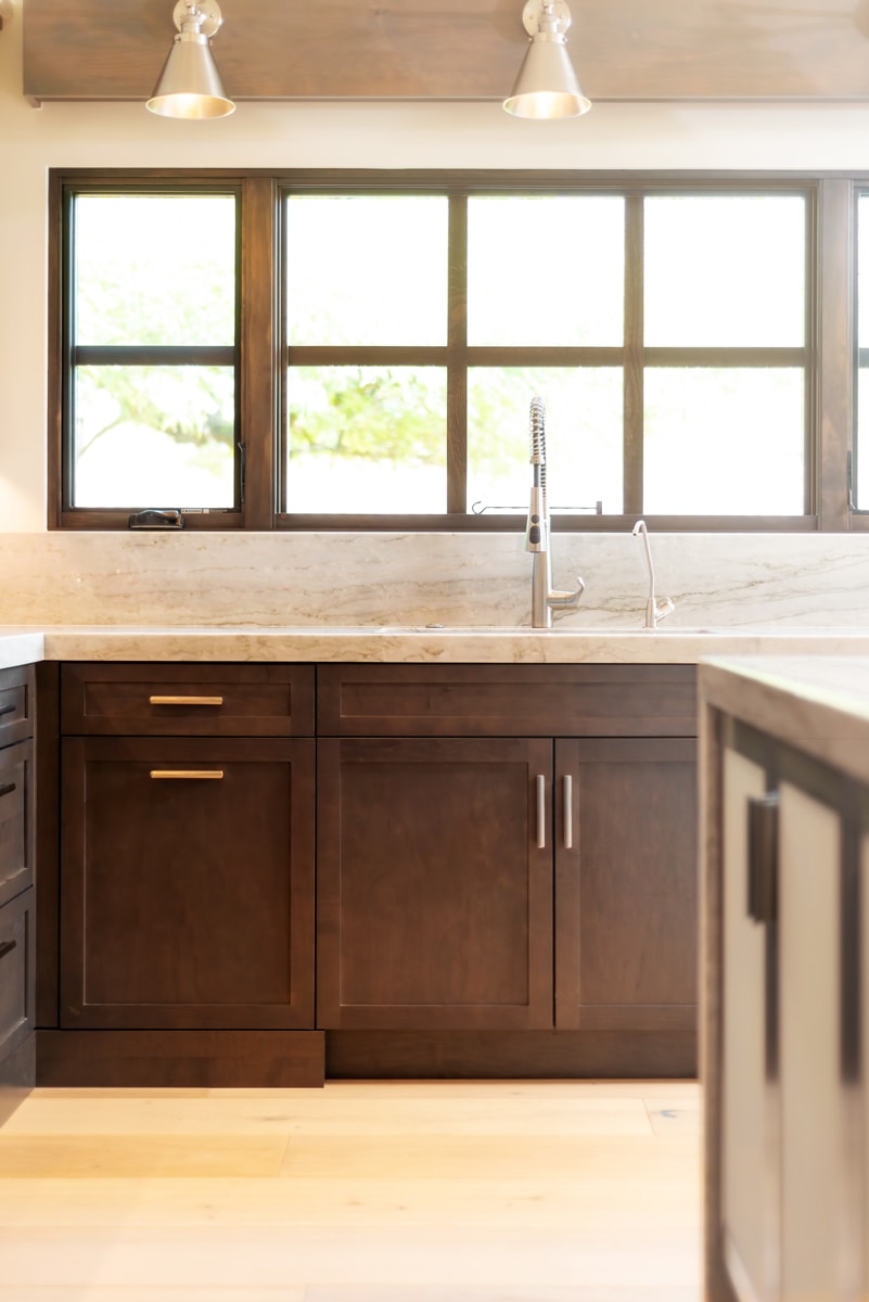 Warm dark brown modern farmhouse style kitchen.