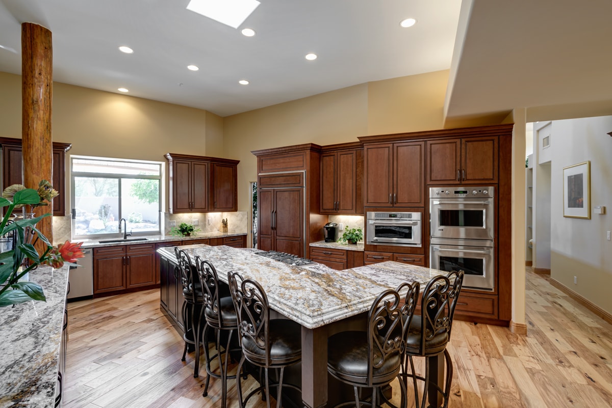 A Traditional style kitchen with lots of rich, warm wood cabinetry.